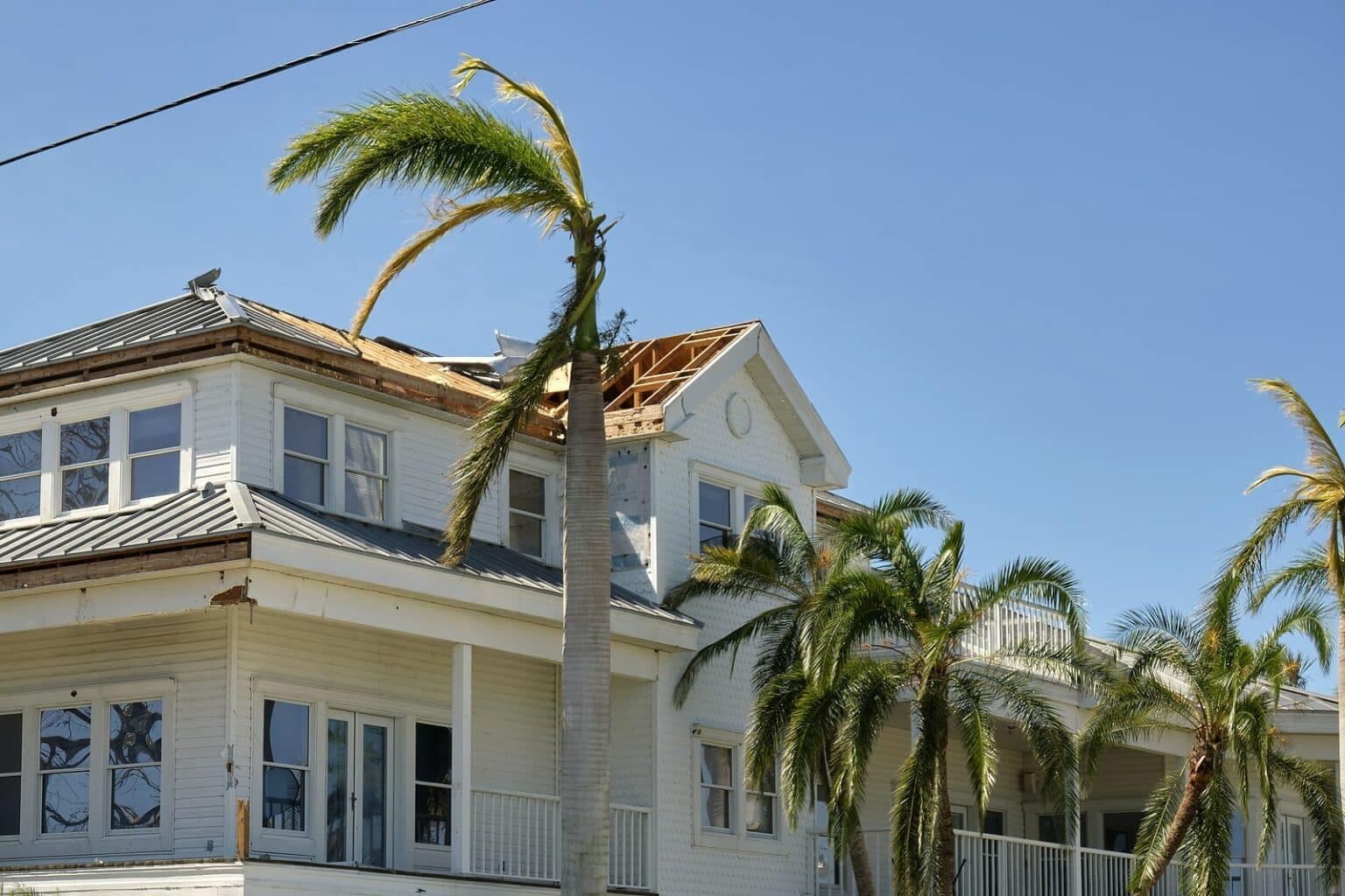 bigstock-Damaged-House-Roof-With-Missin-463219401-min-1536x1024.jpg
