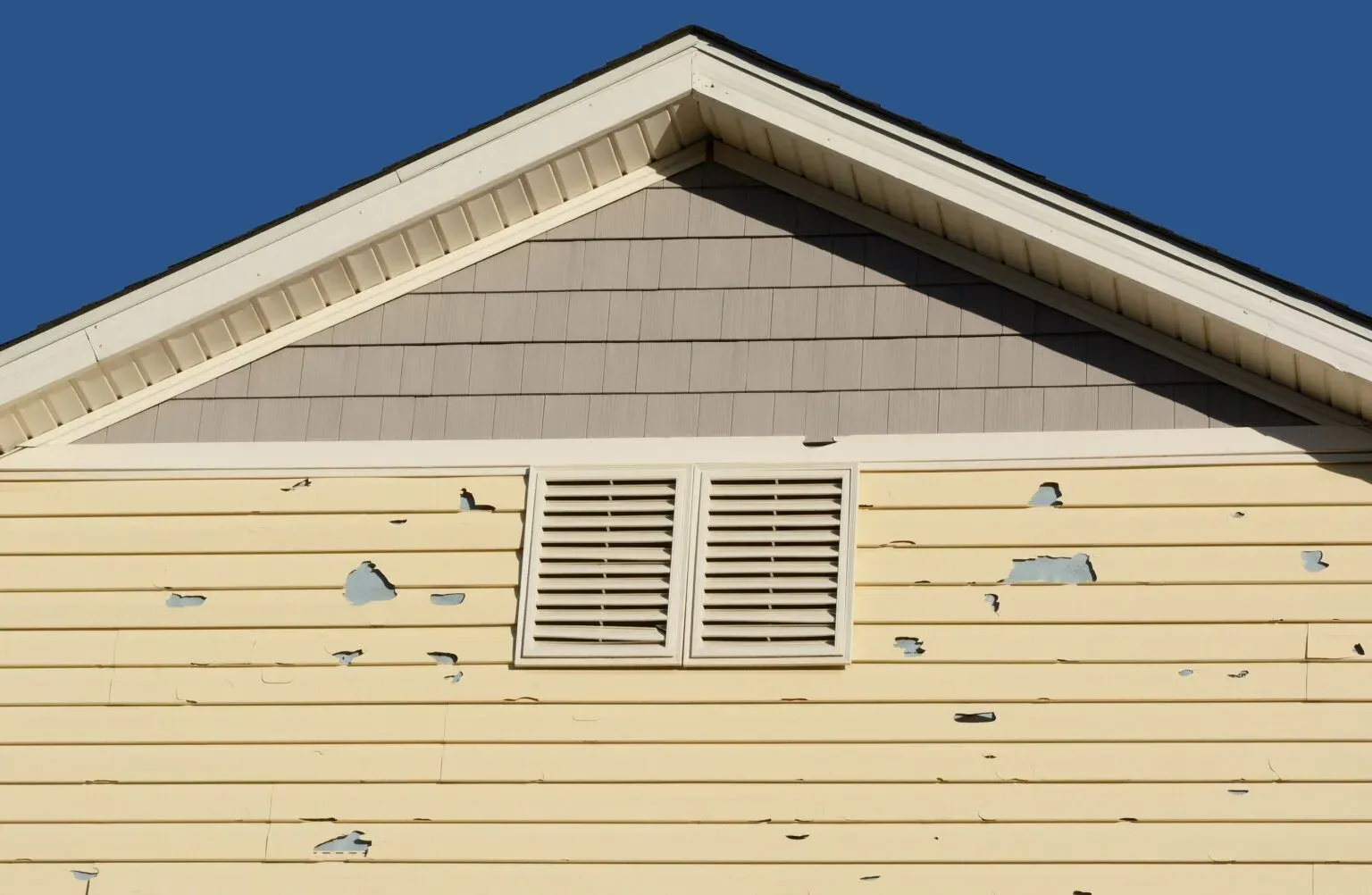 bigstock-Holes-In-Exterior-Siding-In-Ho-237483157-min-1536x1002.webp