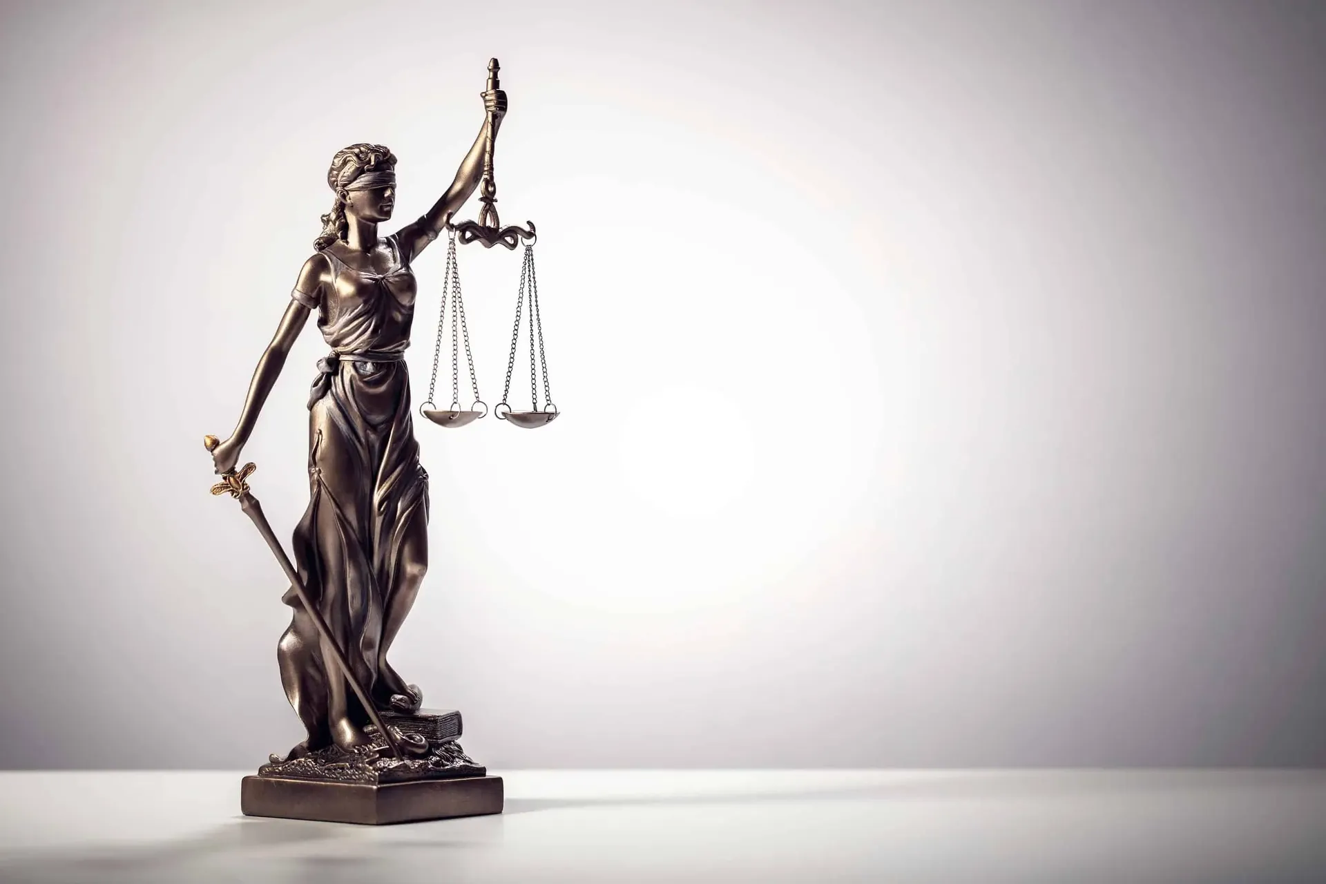 bigstock-Legal-law-concept-statue-of-La-412648168-min