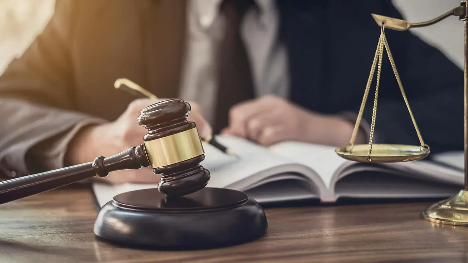 bigstock-Male-Lawyer-Or-Judge-Working-W-450611673-1536x864.webp