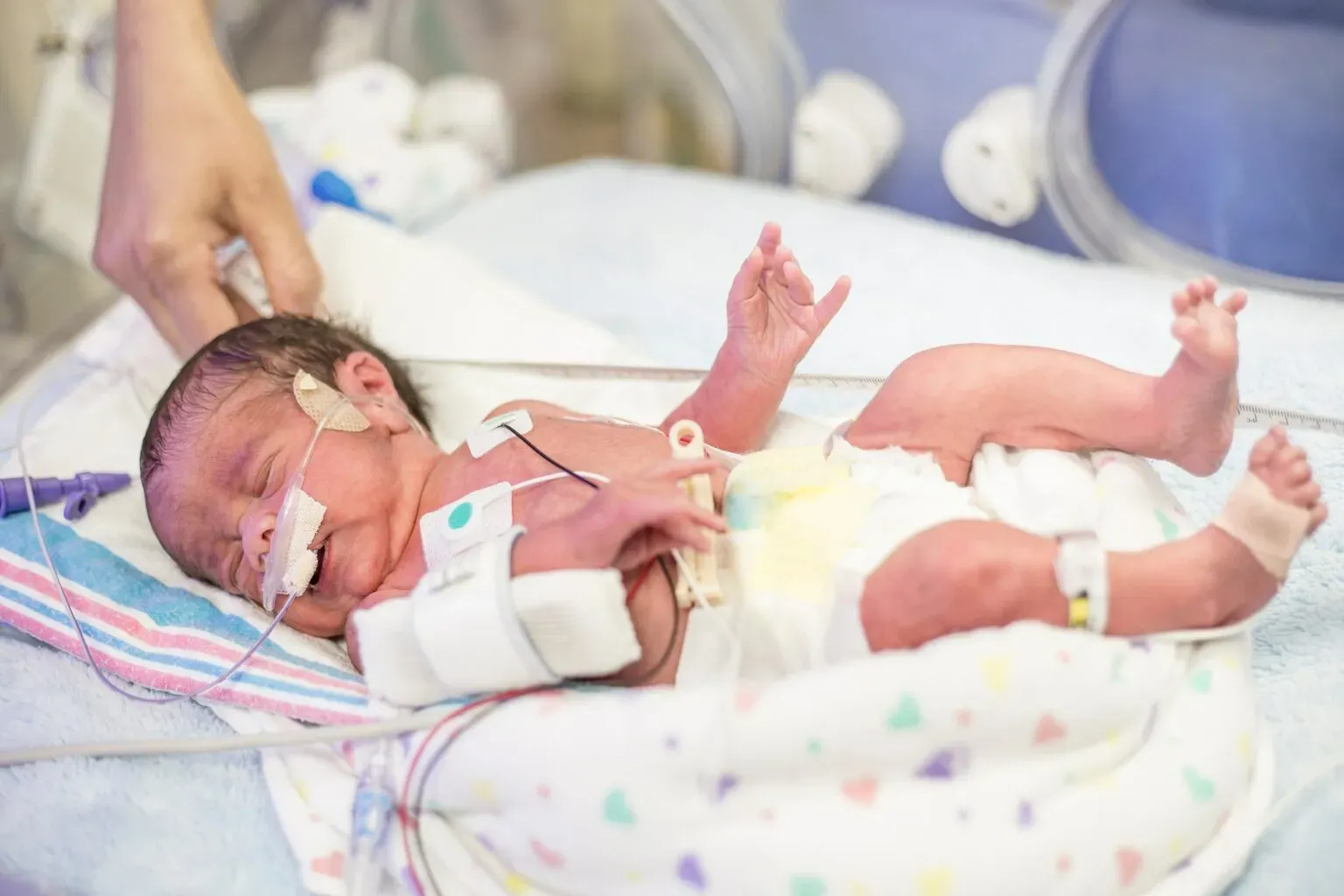 bigstock-Newborn-premature-baby-in-the-219138550-min-1536x1024.webp