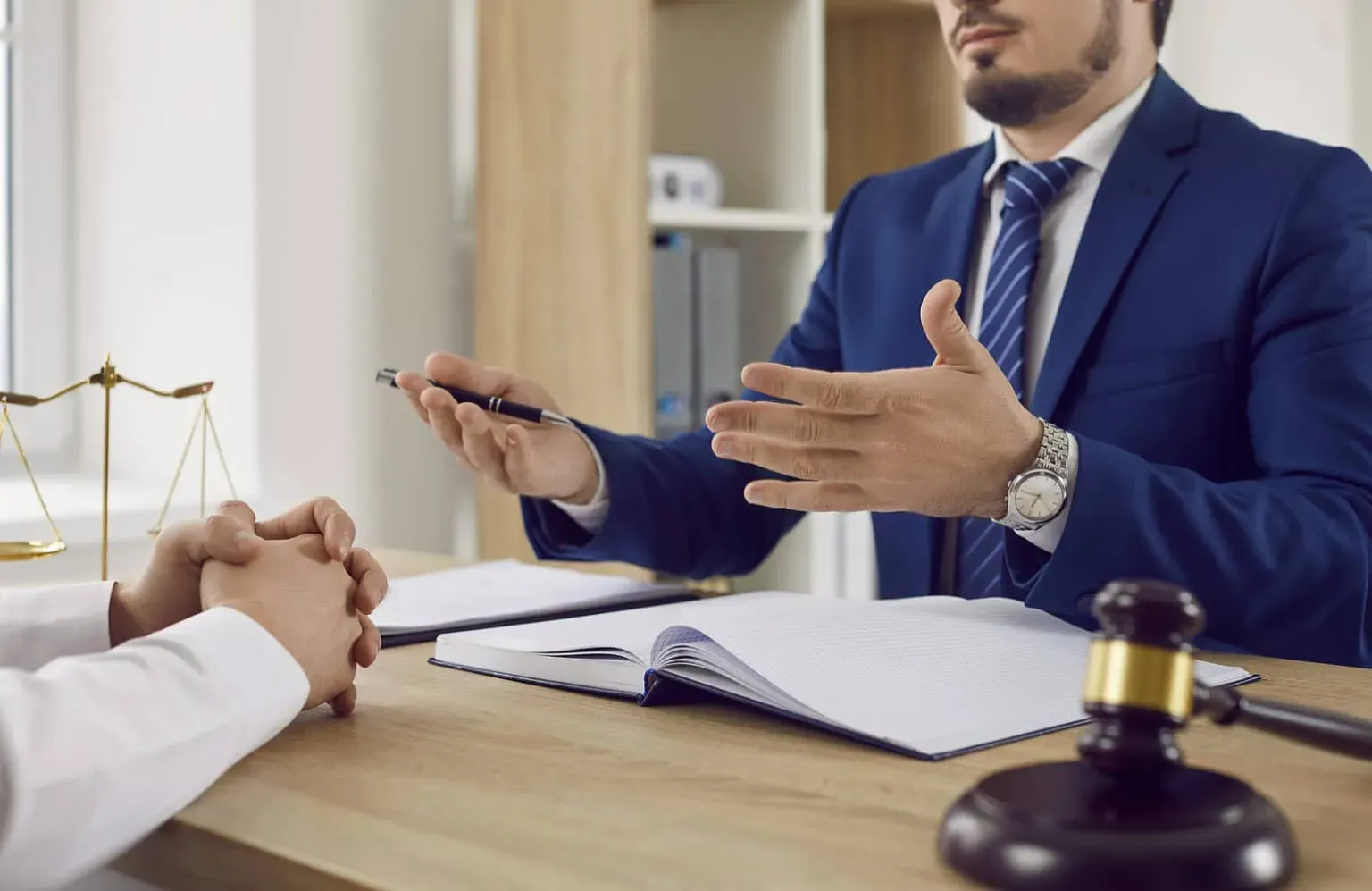 bigstock-Serious-Male-Lawyer-Explains-L-455361937-1536x997.webp