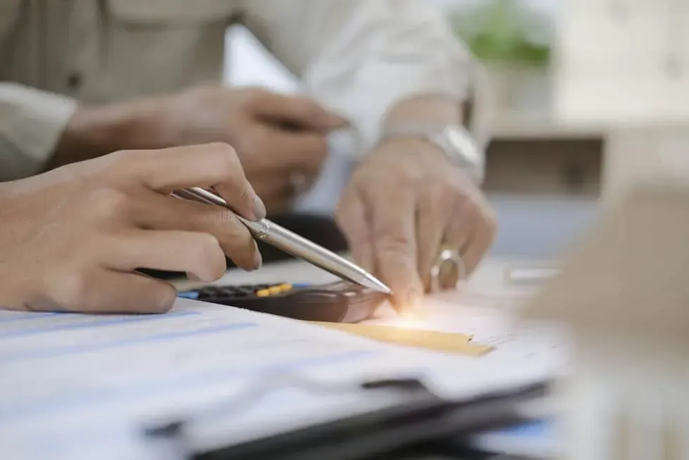 close-up-view-of-lawyer-or-fin-980x654.webp